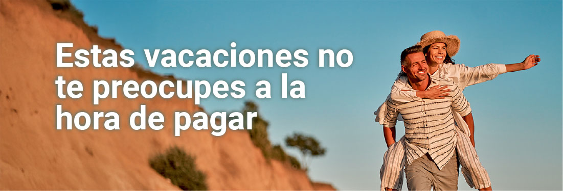 Pareja en una montaña disfrutando de sus vacaciones
